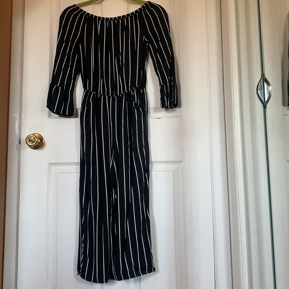 Jumpsuits. Can be worn off shoulder or wide as shown.